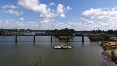 Train on Bridge Crossing River Stock Footage 89412093