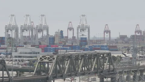 Train Bridge with the freight craines in the back ground Stock Footage 291139657