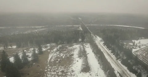 Train Bridge Over Forested Winter Ravine Stock Footage 84977380