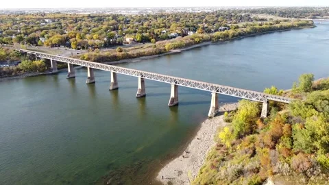 Train Bridge Over River in Saskatchewan Stock Footage 140974021