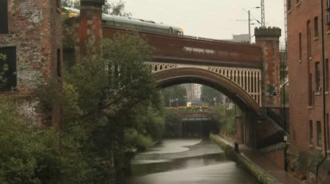 Train on bridge in rain-Time lapse Stock Footage 10700112