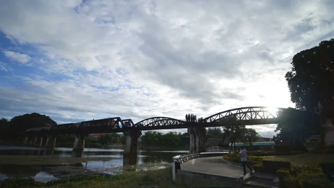 Train on the Bridge River Kwai on sunset in Kanchanaburi, Thailand Video stock 78454123