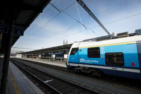 A train with Brno cathedral in the background at Brno Station, Czech Republic Stock Photos