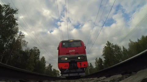 Train buzzes to people. Under train view Stock Footage 55091312