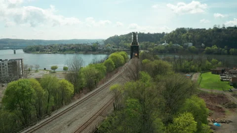 Train with cargo going across bridge Stock Footage 152413279