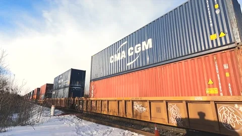 Train carrying containers during winter in Ontario, Canada Stock Footage 148982344
