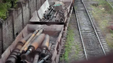 The train carrying scrap metal Stock Footage 12385545