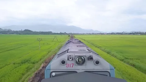 The train cinematically passes under the flying camera Stock Footage 236086953