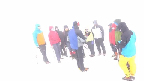 Train climbers in the mountains. Strong wind. Stock Footage 69100032
