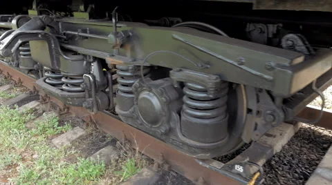 Train coach carriage wheels on rails runway Stock Footage 63473183