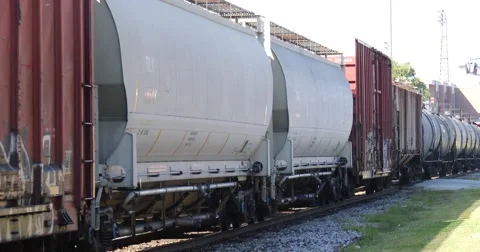 Train Comes to a Stop - Squeak - 4k Stock Footage 67555087