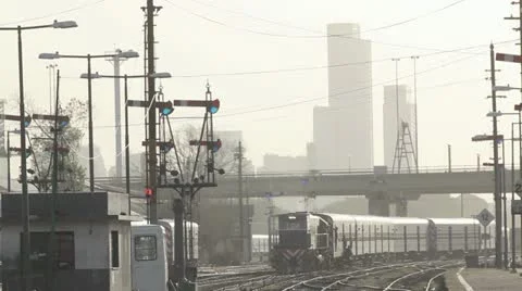 Train coming. Buildings in the back Stock Footage 12720186