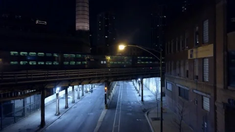Train Coming Into City At Night Stock-Footage 95205521