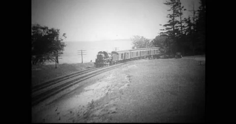 Train coming down railway track Stock Footage 43504328