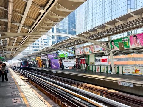 A train coming to the station at the Ploenchit station Stock Photos