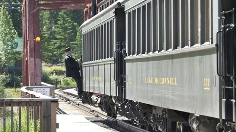 Train Conductor Climbing Down Off The White Pass Yukon Railroad Train Car Stock Footage 80743495