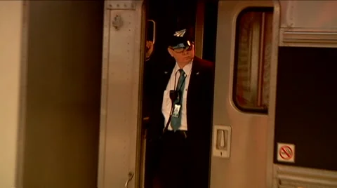 Train conductor rides train out of station, passenger train Stock Footage 45865678