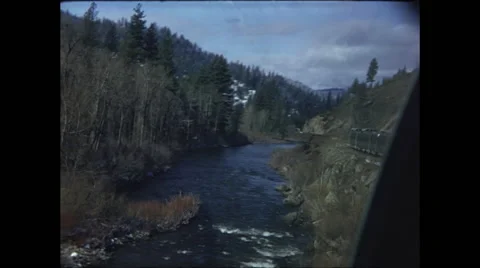 Train Crosses Mountain River Stock Footage 47645040