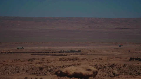 Train crossing Atacama Desert railway tracks Stock Footage 337874743