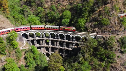 Train crossing big arch bridge Stock Footage 153043814