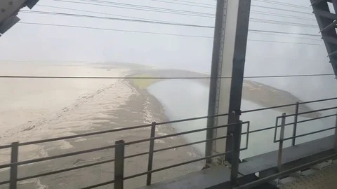 Train crossing the Brahmputra river 動画素材 83634725