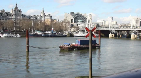 Train crossing bridge accross thames london in background Stock Footage 36364467