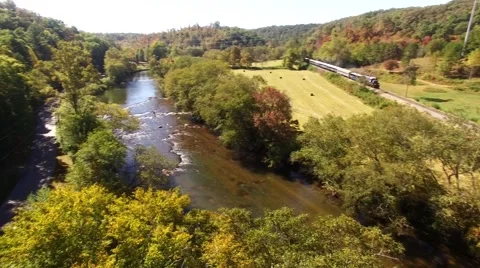 Train crossing bridge Stock Footage 69072632