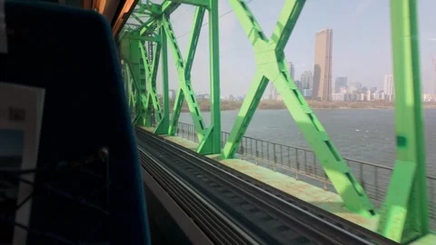 Train crossing the bridge over the Han river in Seoul, South Korea Stock Footage 274830212