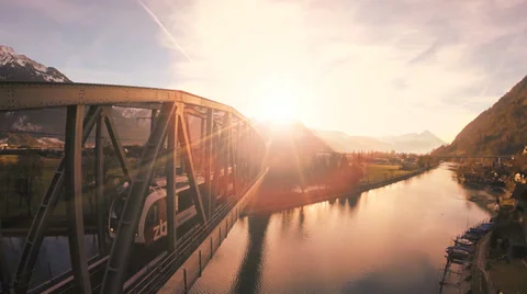 Train crossing bridge. transit transportation. traveling. aerial view Stock Footage 34523754