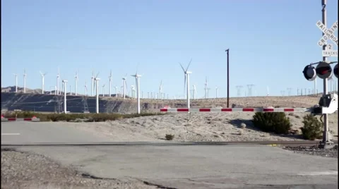 Train Crossing In The Desert And Glimpse Of Windmills  Stock Footage 50615033