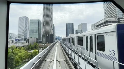 Train crossing each other on bridge | Odaiba, tokyo, japan Stock Footage 242862307