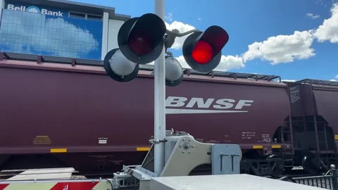Train Crossing - Flashing Red Warning Lights - Fargo, ND - July 17, 2025 Stock Footage 313849750
