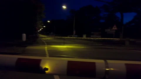 Train Crossing at night Stock Footage 163687190