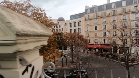 Train crossing over bridge with Paris city buildings view from the train window Stock Footage 105724255