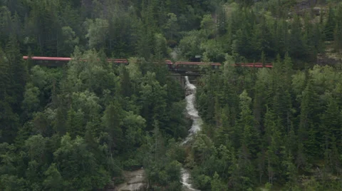 Train crossing over waterfall Stock Footage 33046295