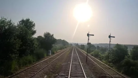 Train Crossing a Railway Station Stock Footage 318736152