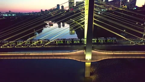 Train crossing the River after Sunset Stock Footage 250373542
