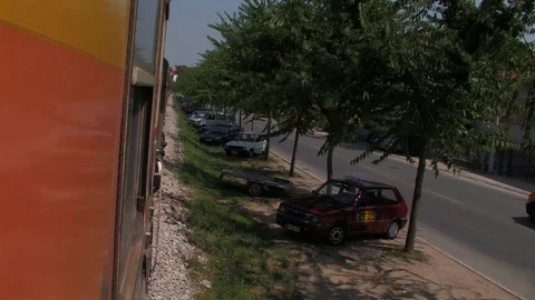 Train crossing small serbian town Stock Footage 93963004