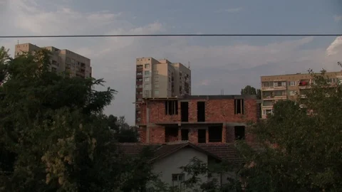 Train crossing small serbian town Stock Footage 93963166