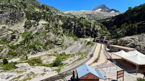Train d'Artouste Terminus Station with Narrow Gauge Tracks in Rocky Pyrenees Stock Footage 346576630