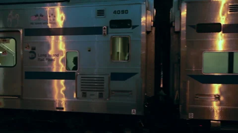 Train departing station in evening (2 of 2) Video stock 32302285