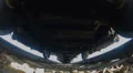 Train is departing from the station. Under train view HD Footage
