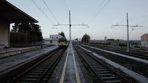 The train departs from the empty station Stock Footage 88038158