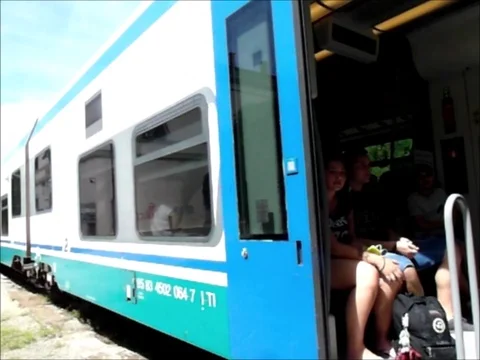 Train departs from the small station Stock Footage 118447492
