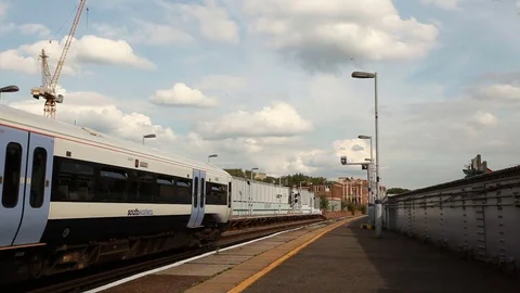Train departs from the stop Video stock 76386331