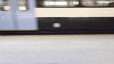 Train departs from the stop Video stock 76387468