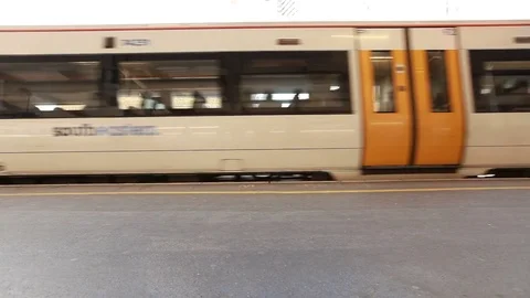 Train departs from the stop Video stock 76387850