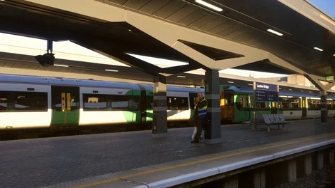 A train is departuring in a modern train station London 스톡 동영상 103838490