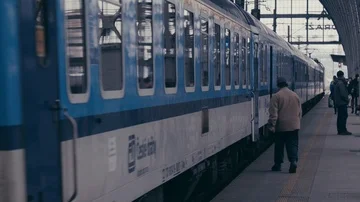 Train is departuring from a railway station Stock Footage