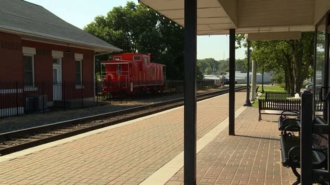 Train Depot Platform with caboose Stock Footage 92226797